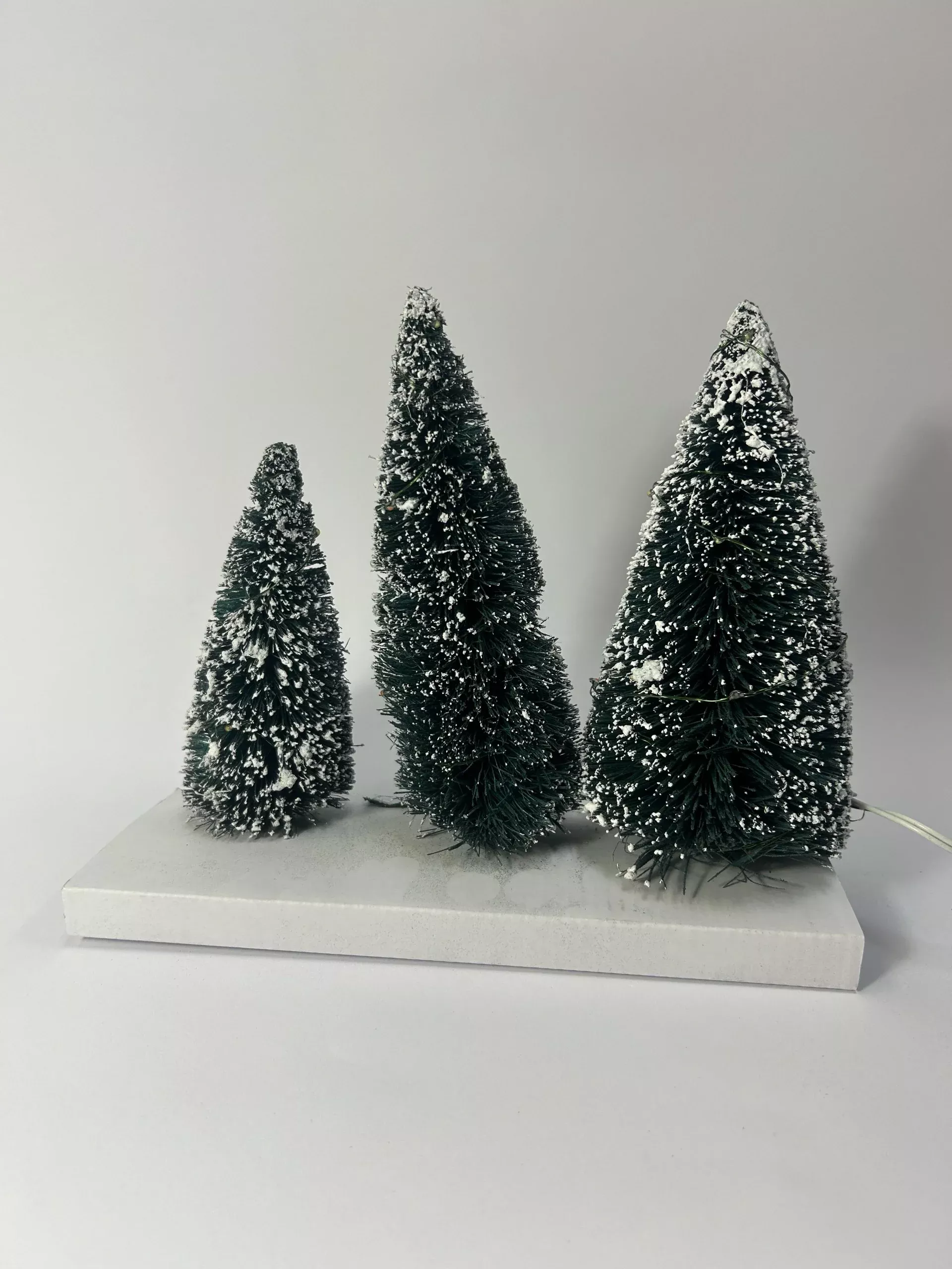 Village Twinkling Lit Trees